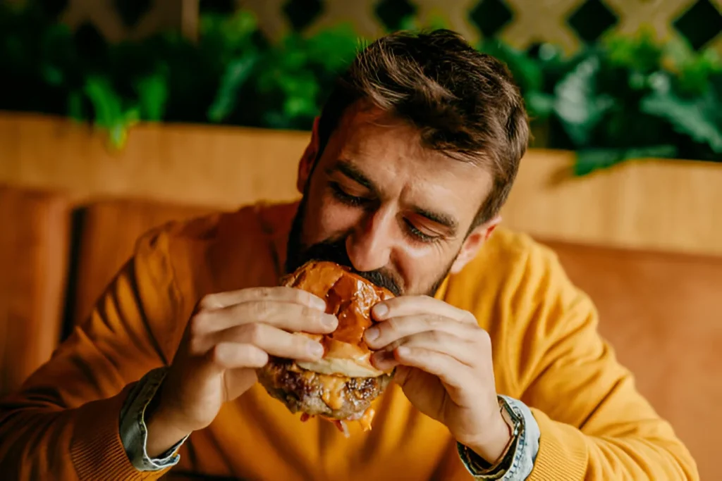 Wendys Mashroom bacon cheeseburger first bite